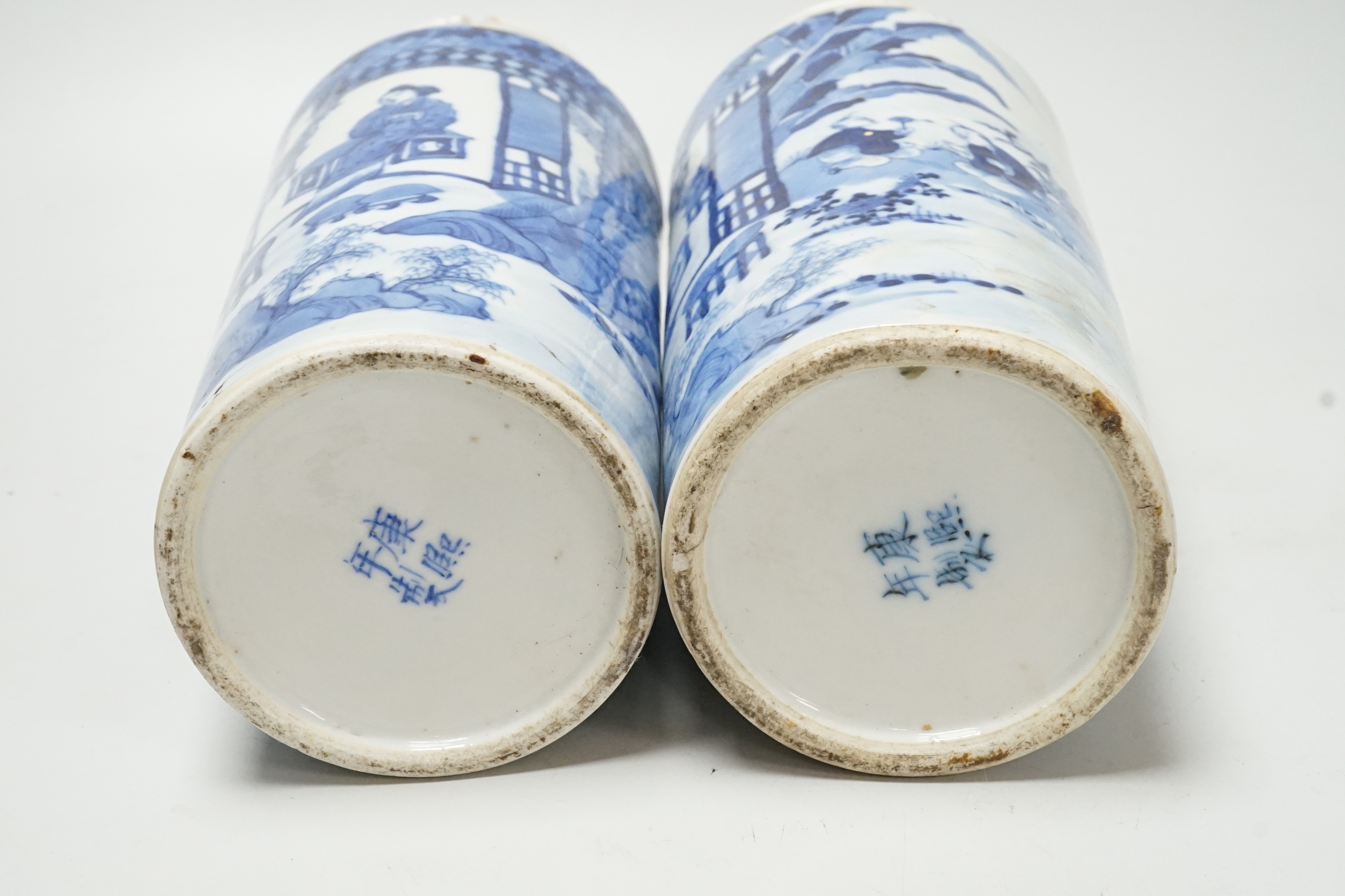 A pair of late 19th century Chinese blue and white vases, 31cm